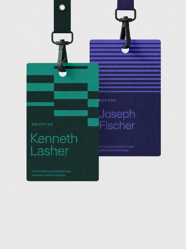 GROPYUS Building OS: employee ID badges on branded lanyards, green and purple colorways